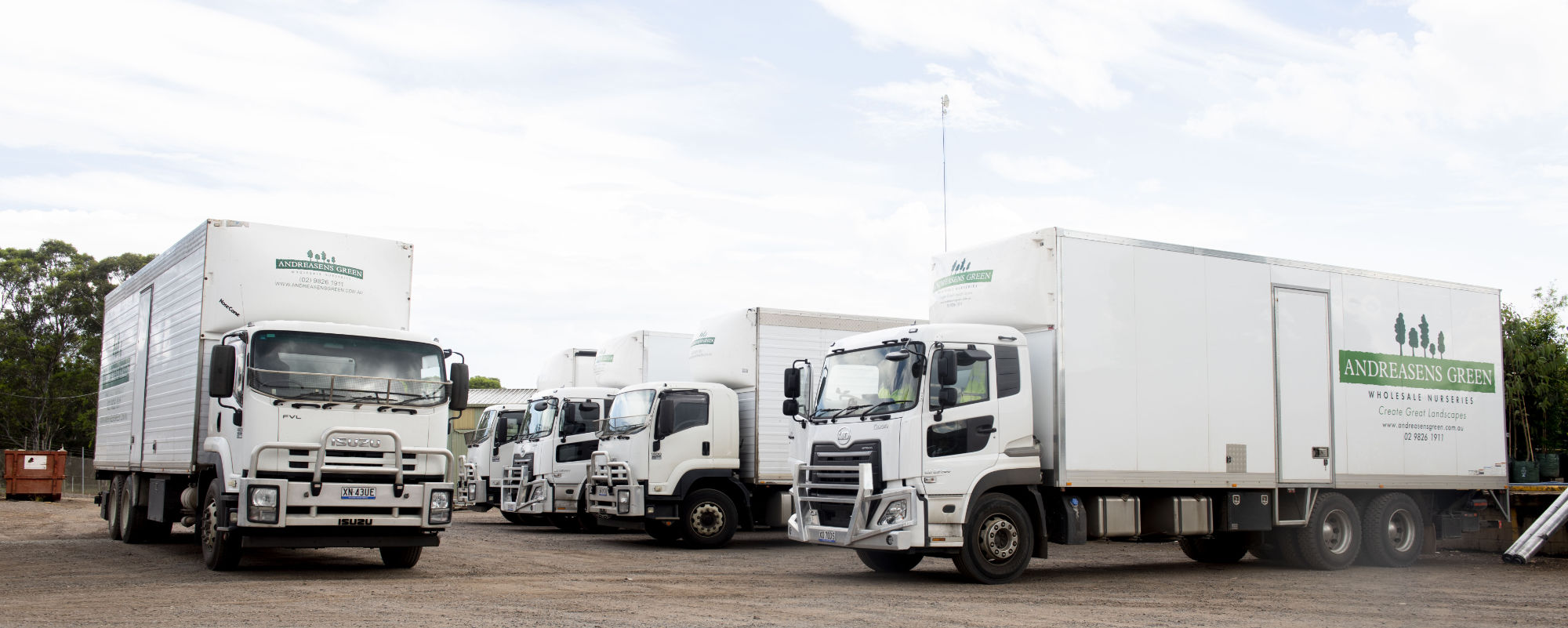 Andreasens Green fleet of trucks