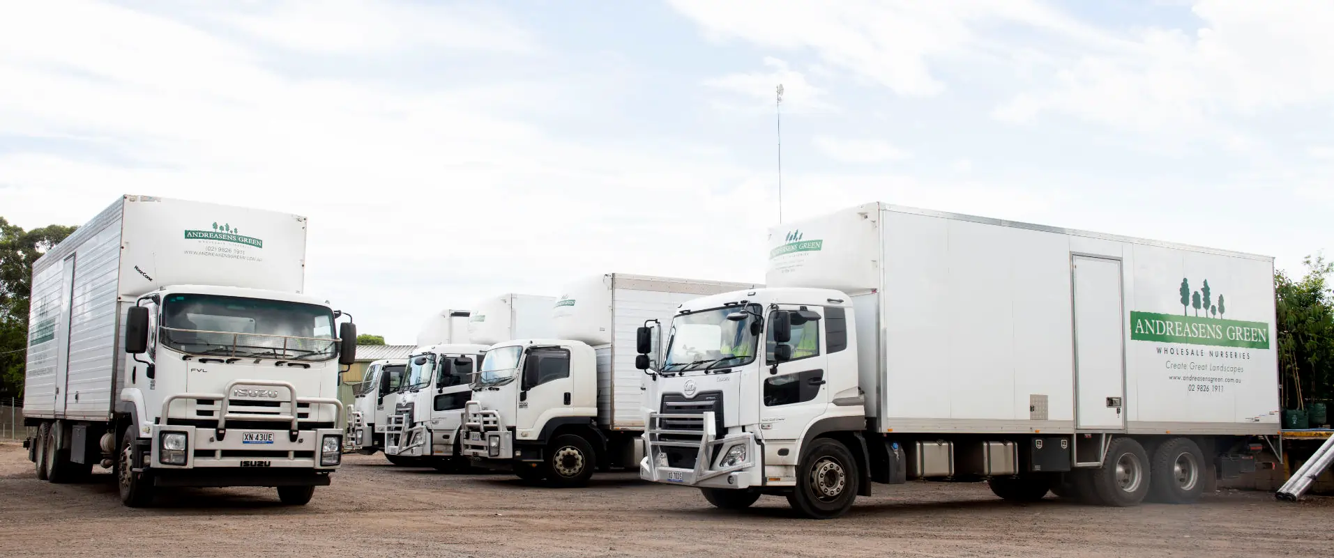 Andreasens Green fleet of trucks